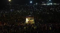 Filipino Catholics pray for good health and peace in huge procession venerating Jesus statue