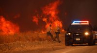 Firefighters battle to maintain the upper hand on a huge fire north of Los Angeles