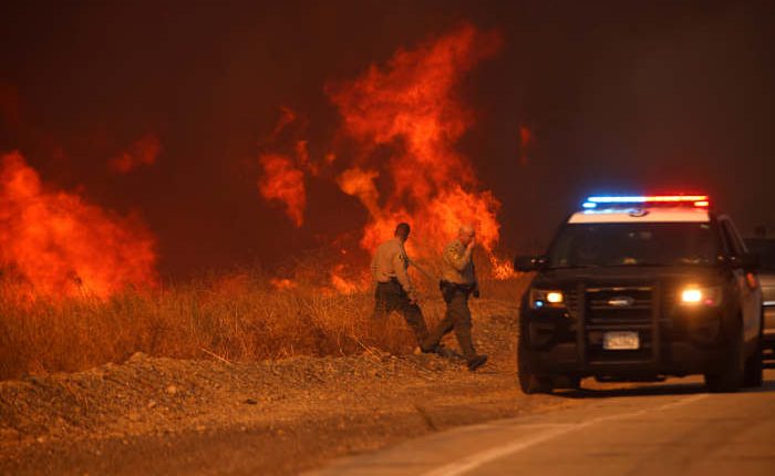 Firefighters battle to maintain the upper hand on a huge fire north of Los Angeles