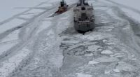 Freighter on the move after it was freed from ice on frozen Lake Erie