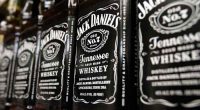 Jack Daniels' parent Brown-Forman is cutting its workforce and closing its barrel-making plant
