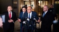 Judge will weigh holding Giuliani in contempt of court after jury's $148 million defamation award