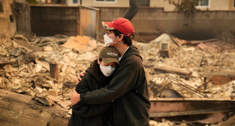 LA area's 2 biggest blazes burn at least 10,000 structures, while new fire leads to more evacuations