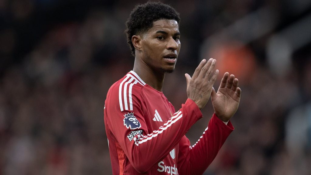 Marcus Rashford takes in Manchester United's Europa League clash with Rangers from the stands at Old Trafford - with wantaway star no closer to a move away from his boyhood club