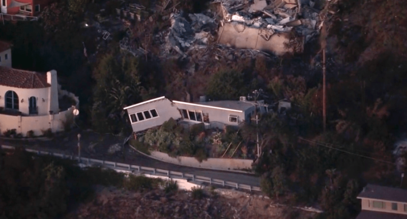 Mud, debris slide splits hillside home that survived Palisades Fire in half
