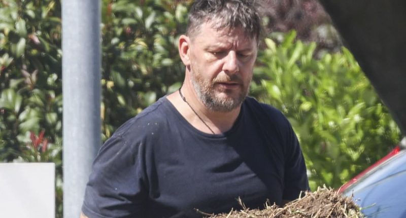 My Kitchen Rules star and celebrity chef Manu Feildel spotted getting stuck into gardening with his wife Clarissa over the long weekend