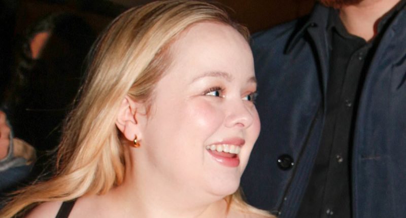 Nicola Coughlan puts on a busty display in black dress in Paris