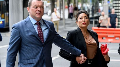 Analisa Corr, daughter of former Philippines president Ferdinand Marcos, leaves court in Sydney.