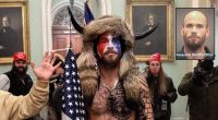 'QAnon shaman' announces gun buy after Trump's Jan. 6 pardon