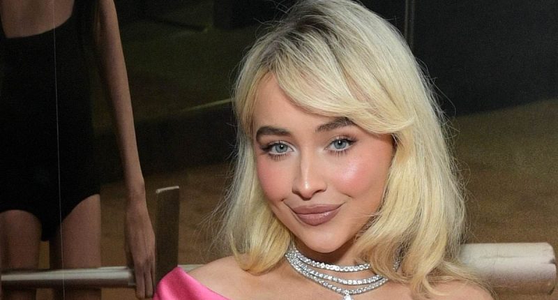 Sabrina Carpenter puts on a leggy display in a pink mini dress