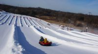 Scarves over headscarves, Muslim women’s outdoors group tackles snow tubing in Minnesota