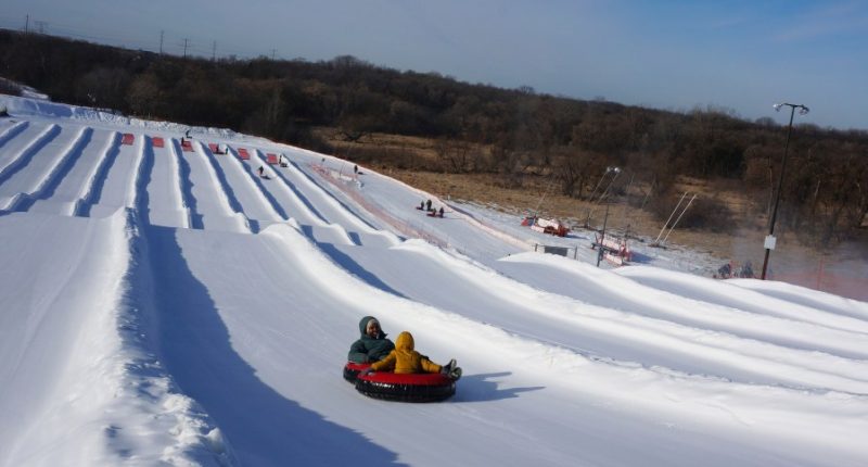 Scarves over headscarves, Muslim women’s outdoors group tackles snow tubing in Minnesota