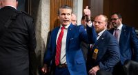 Senate panel advances Defense secretary nominee Hegseth on party-line vote