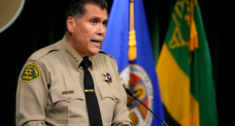 Sheriff calls on wildfire evacuees to be patient amid 'grim' search for bodies