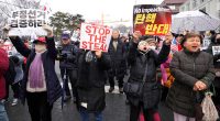 South Korean anti-corruption agency asks police to take over efforts to detain impeached Yoon
