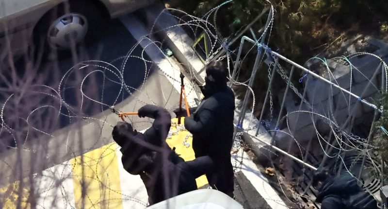 South Korean officials detain impeached President Yoon on second attempt