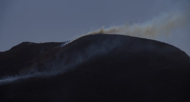 Southern California rain helps firefighters but creates risk of toxic ash runoff