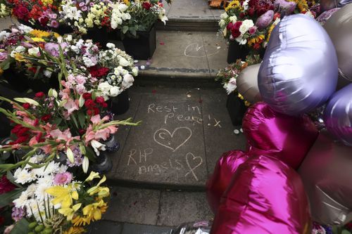Tributes are seen outside the Town Hall in Southport, England, Aug. 5, 2024 after three young girls were killed in a knife attack at a Taylor Swift-themed holiday club the week before