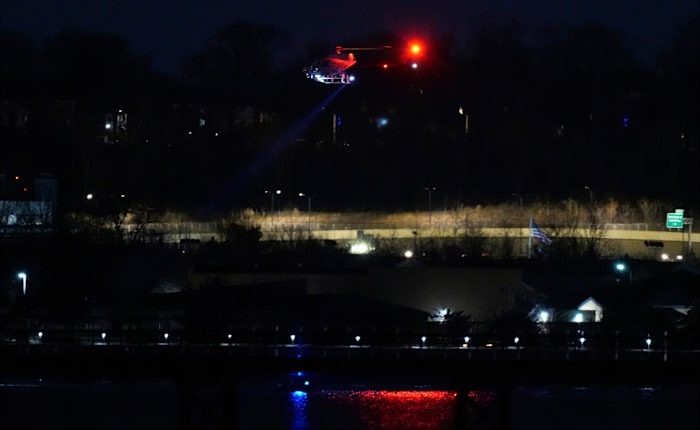 The Latest: Passenger jet collides with helicopter while landing at DC's Reagan National Airport