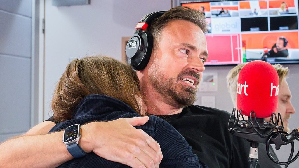 The emotional moment Jamie Theakston, 54, hugs pals Davina and Amanda