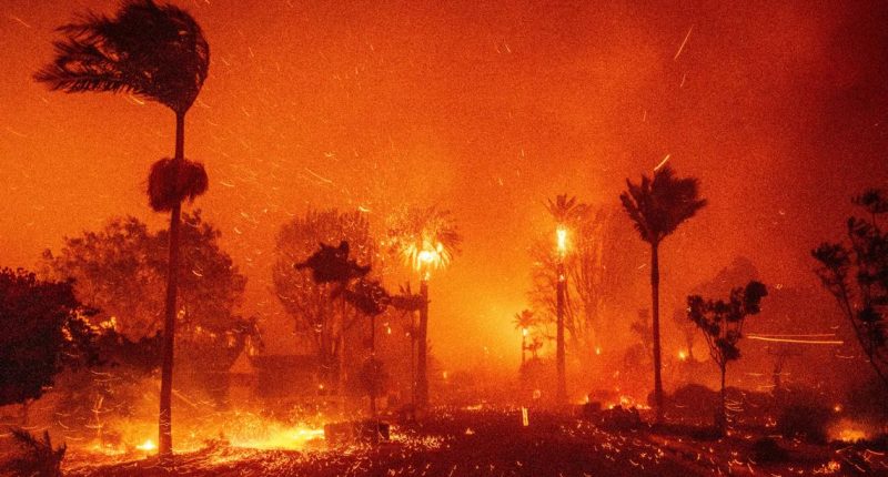 Thousands evacuate as wildfire in LA threatens homes, lives