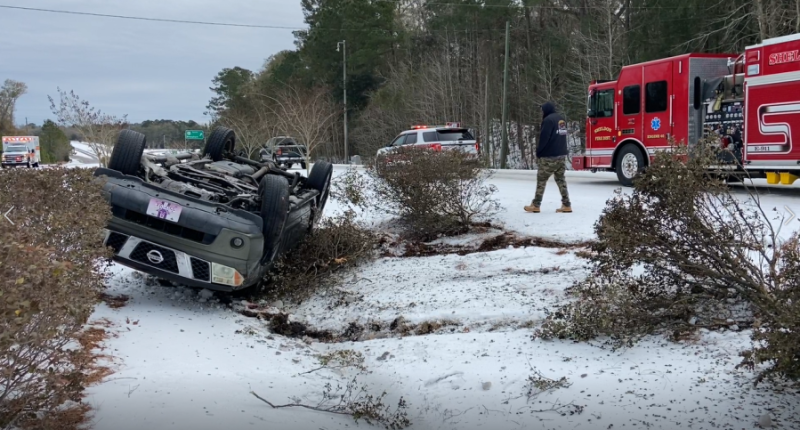 Truck flips in Beaufort County as officials warn of road conditions