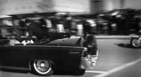 FILE - The limousine carrying mortally wounded President John F. Kennedy races toward the hospital seconds after he was shot, Nov. 22, 1963, in Dallas. The 60th anniversary of President Kennedy's assassination, marked on Wednesday, Nov. 22, 2023, finds his family, and the country, at a moment many would not have imagined in JFK's lifetime. (AP Photo/Justin Newman, File)