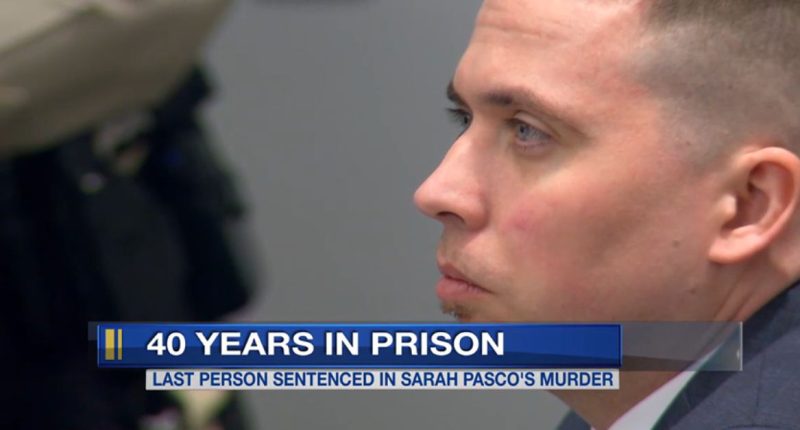 Victim hid under murdered woman's body in well to survive