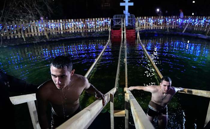 Warm weather threatens Epiphany ice water plunges for Russia's Orthodox Christians