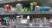 Medicines on a pharmacy shelf.