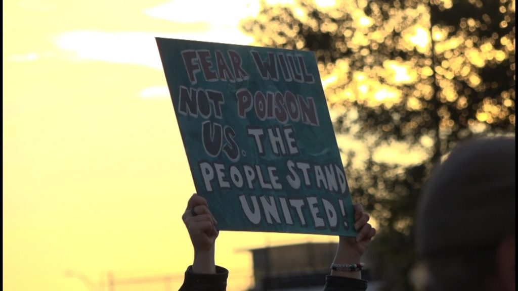 'We are ready to fight': Community activists protest against President Trump outside Duval County courthouse
