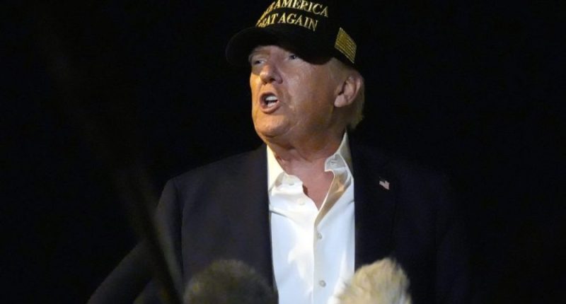President Donald Trump talks with reporters before boarding Air Force One at Los Angeles International Airport in Los Angeles, Friday, Jan. 24, 2025, en route to Las Vegas. (AP Photo/Mark Schiefelbein)