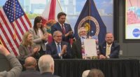 Gov. Ron DeSantis attends the signing of the Florida University Space Research Consortium on Wednesday.