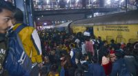 Crowded train platform in New Delhi, India.