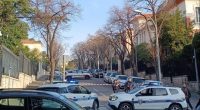 Police cars outside a building following a bomb explosion.