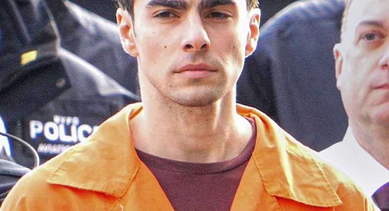 Luigi Mangione, suspect in the murder of UnitedHealthcare CEO Brian Thompson, arriving at a helipad.
