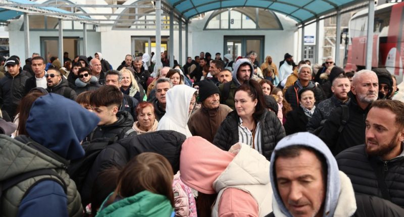 Residents and tourists evacuating a Greek island by ferry and plane.