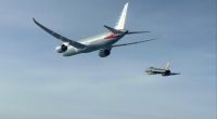 American Airlines flight escorted by Eurofighter jet.