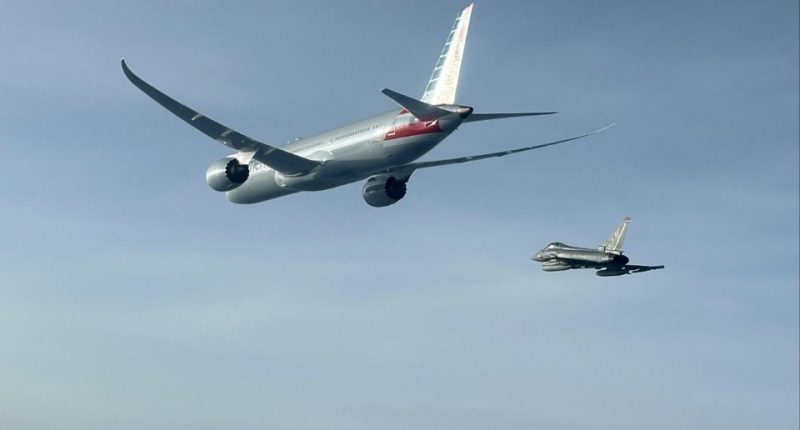 American Airlines flight escorted by Eurofighter jet.