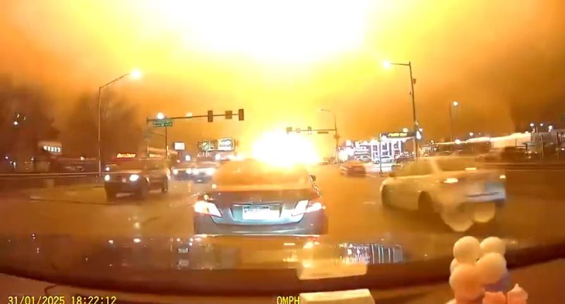 Explosion erupts in front of drivers at stoplight after plane plummets