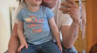Photo of a man and his young daughter.