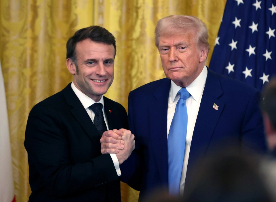 President Macron and President Trump shaking hands.