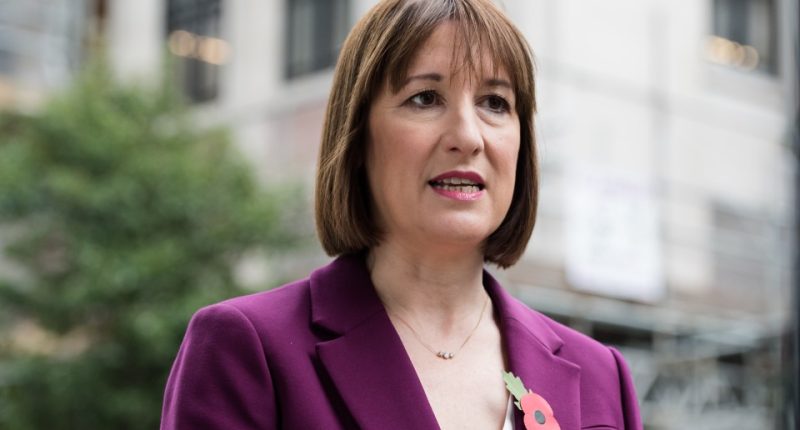 Rachel Reeves, Britain's Chancellor of the Exchequer, holding the red budget box.