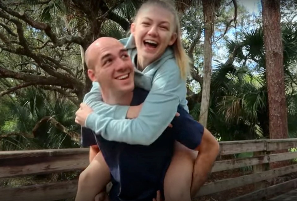 Gabby Petito and Brian Laundrie in a piggyback ride.