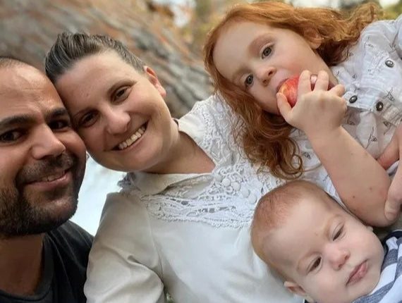 Family portrait outdoors.
