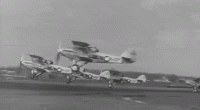 GIF of biplanes taking off.