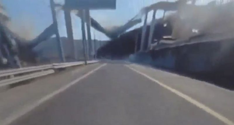 Driving on a bridge.