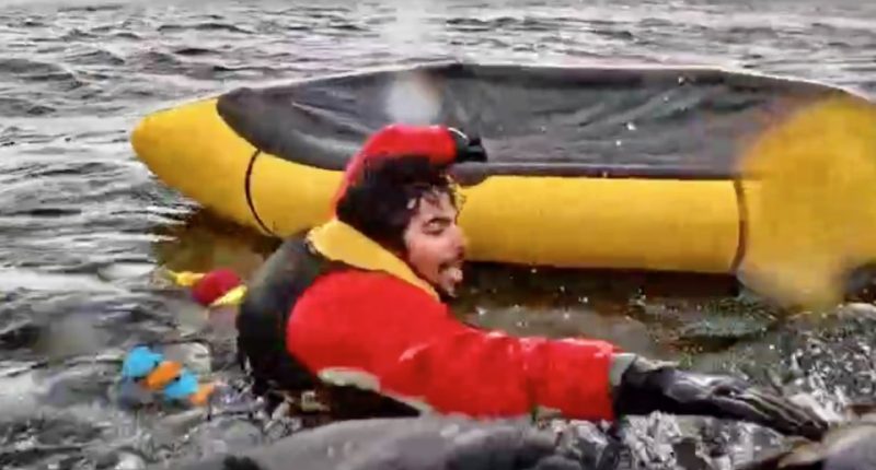 Man in red jacket rescued from water after being swallowed by a whale.