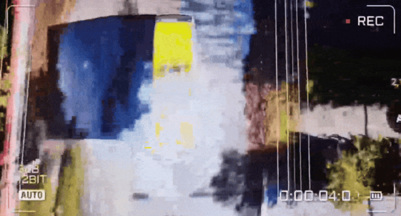 Grainy video footage of Russian drone attack on civilians in Kherson.