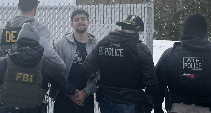 Illegal Brazilian gang member convicted of assault flashes sinister smile during arrest in Massachusetts